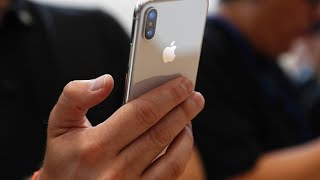 Shocking video shows iPhone battery bursting into flames after man bites it