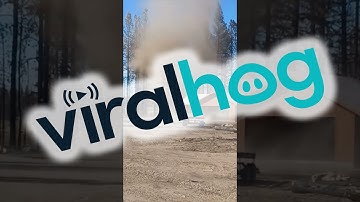 Large Dust Devil Swirls Around House at Job Site || ViralHog