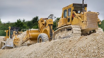 Cat D6T Dozer Pushing Scrapers