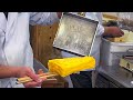 japanese street food - busy Tamagoyaki chef  玉子焼き