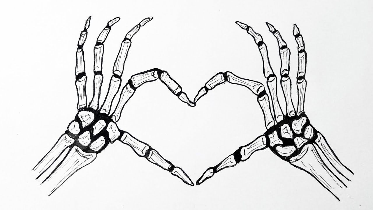 Discover 78+ skeleton hand heart tattoo latest - thtantai2