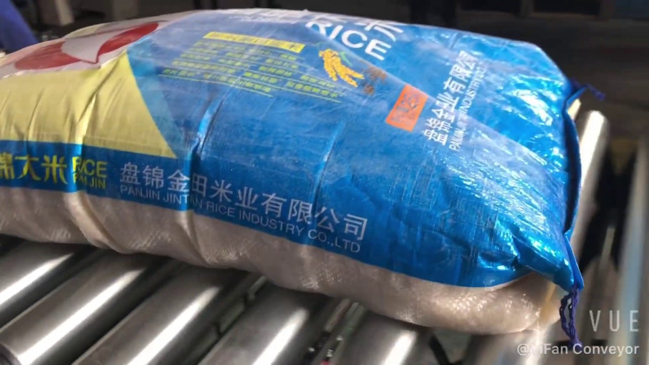 Download 25KG Rice Bags Loading Unloading Extendable Conveyor - YouTube