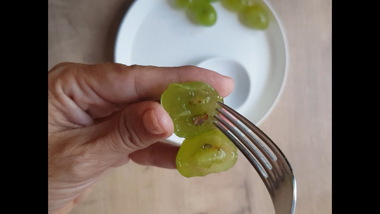 How to remove the seeds from grapes with a fork.