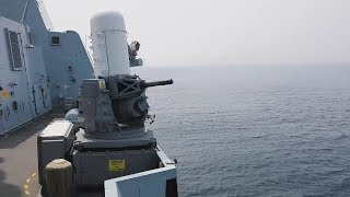 HMS DEFENDER Fires PHALANX Close-In Weapon System (CIWS)