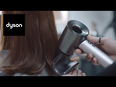 Using the attachments on the Dyson Supersonic™ professional hair dryer