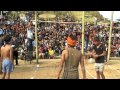 Naga boy takes a high jump to kick piece of meat : meat-kicking competition