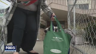 Waukesha condo residents grab essentials after evacuation | FOX6 News Milwaukee