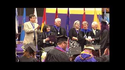 Haskell Indian Nations University Spring 2015 Commencement graduates walking