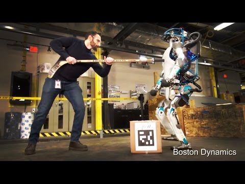 atlas-the-next-generation-robot---harassed-with-hockey-stick!