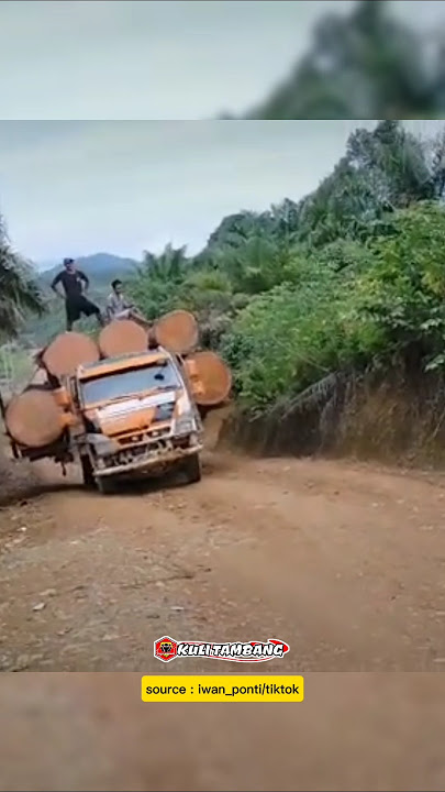 until it swerved, overloaded truck in Indonesia