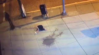 "Nobody called 911": Witnesses rob, take photos of unconscious woman
