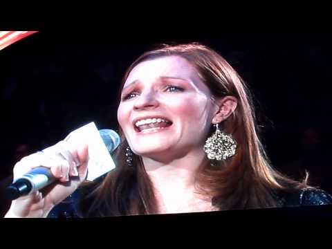 Corinne DeVries sings the national anthem at the L...