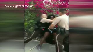 Viral video of woman's arrest leads to officer being relieved of duty