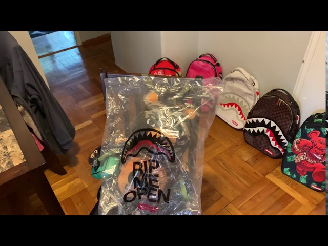 Unbxng - Sprayground money shark backpack