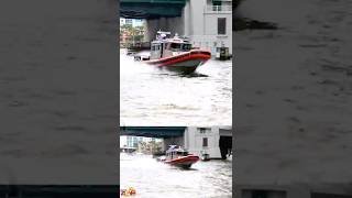 Coast Guard Police Chasing A Jet Ski Full Speed On The River Boat Zone