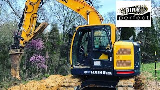 Installing the first septic system of the season with the Hyundai HX145 excavator #arc36chambers
