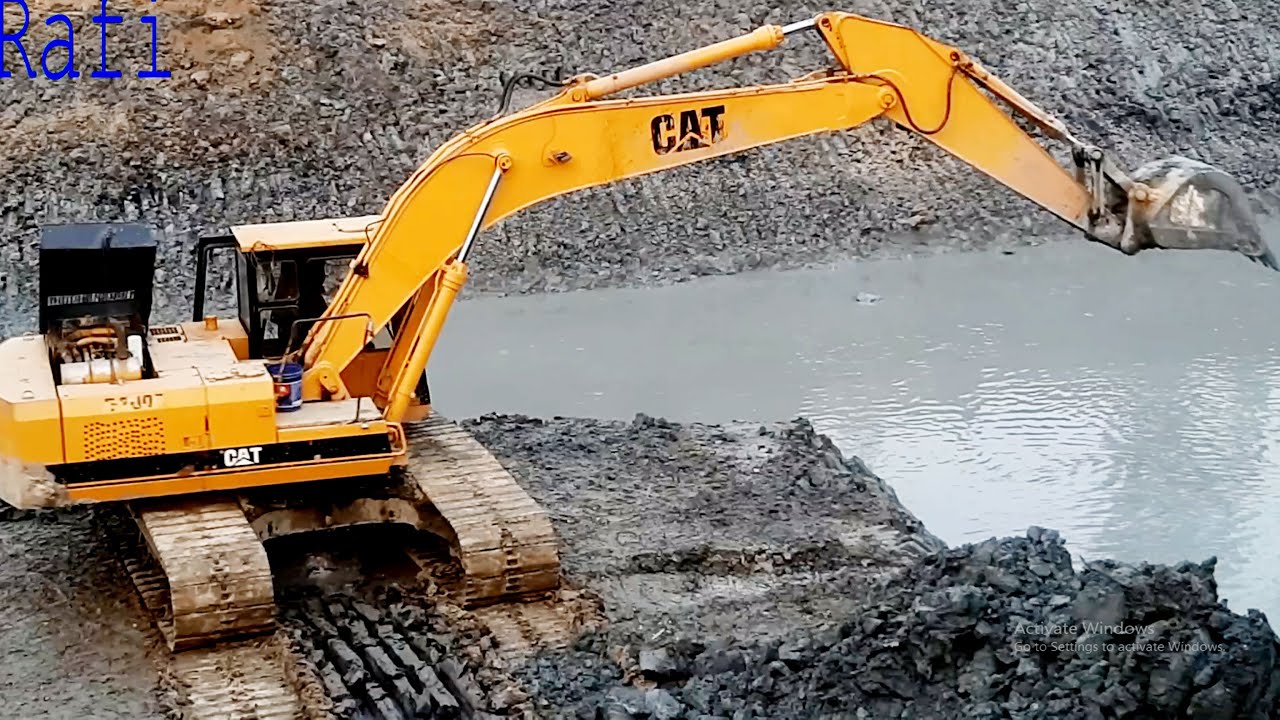 CAT loading Mud CAT Working for Metro making Jcb video CAT - YouTube