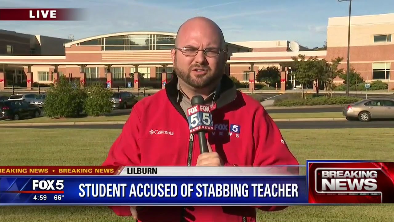 Teacher stabbed at school - YouTube