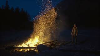 Couple By Campfire Stock Photo..