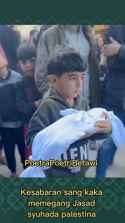 Kesabaran sang kaka memegang jasad syuhada palestina