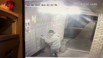 Man caught on video breaking into mailboxes at NE Side apartment complex