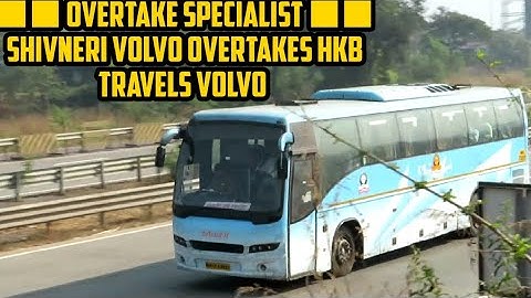SHIVNERI VOLVO CRUISES ON PUNE MUMBAI EXPRESSWAY AND OVERTAKING HKB TRAVELS VOLVO