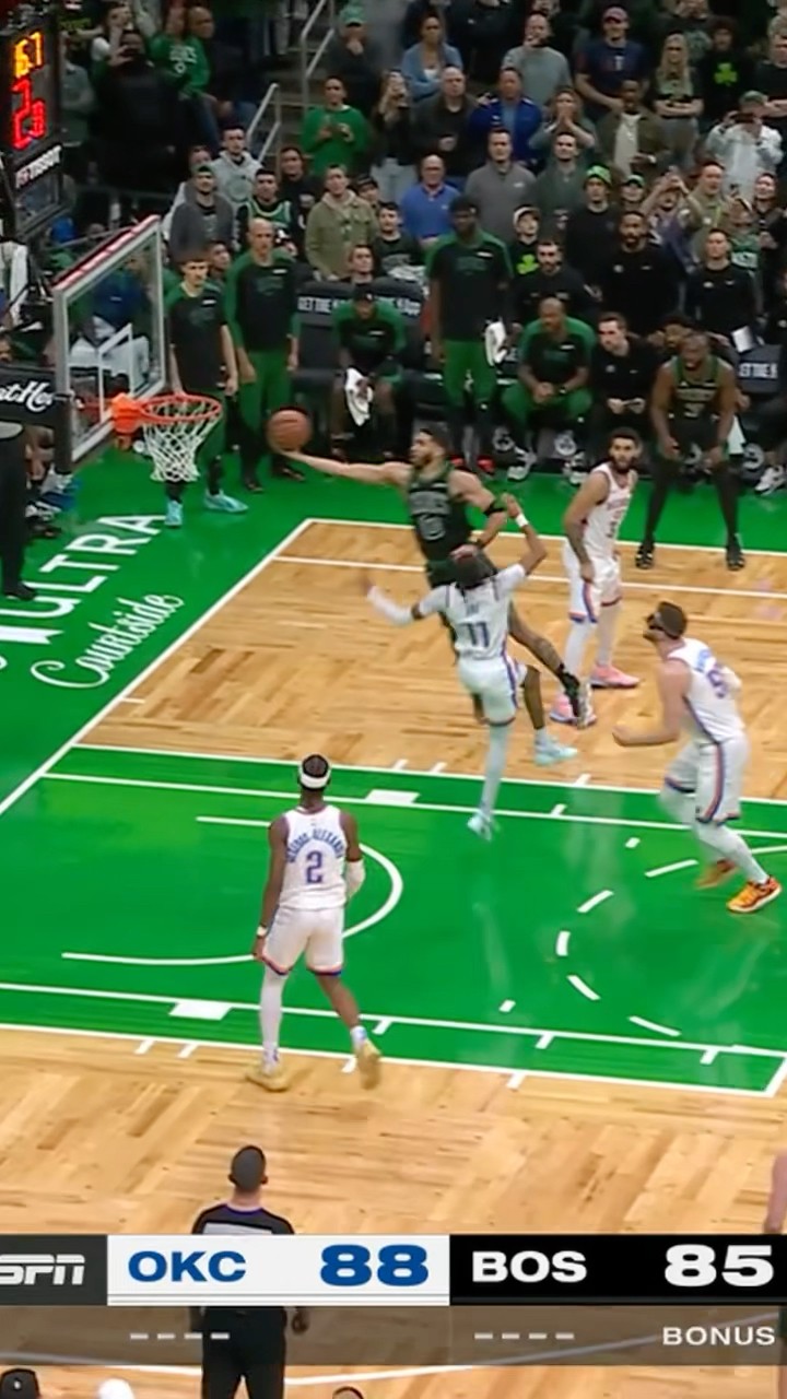 Jayson Tatum splits the trap for the tough lay