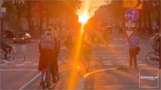 Cyclists at sunset. Amsterdam - October 28, 2021 18:02