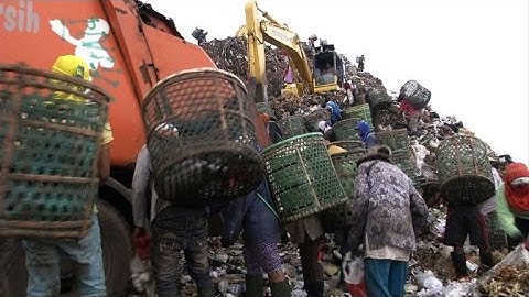As garbage mountains rise, Indonesian capital faces waste crisis