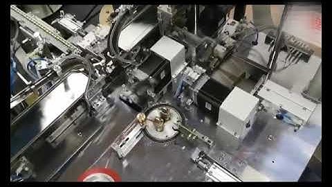 Automatic EE core assembly, taping & testing machine WM-1948CATS. newwinhk@hotmail.com