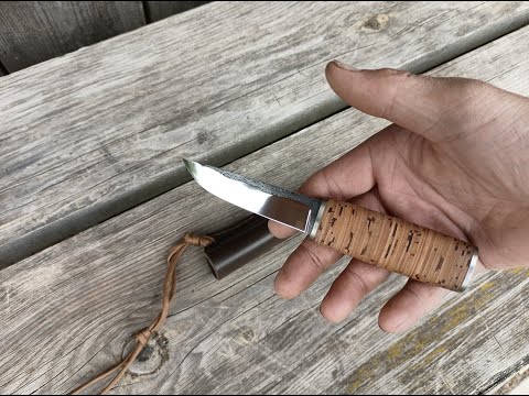 Small puukko and another K110 steel knife
