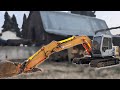 Removing and disassembling hydraulic cylinders - excavator project