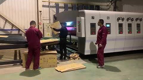 Corrugated carton box printing slotting rotary die cutting vibration stacker machine