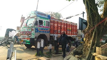 Gateman In Trouble To Close Railgate overloaded Trucks And High Speed Train Skipping On The Track