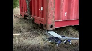 Leveling Our Shipping Container with a Floor Jack and a High Lift Jack