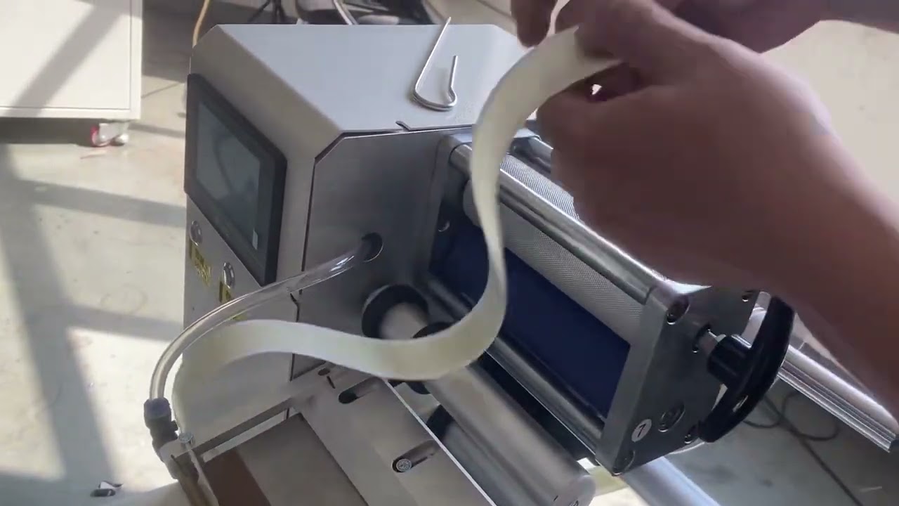 Label threading tutorial for flag tagging machine