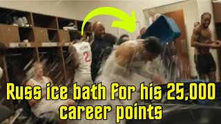 Zubac holds Russ still for the ice bath for his 25,000 career points celebration