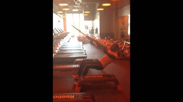 Single arm TRX Squat Row at Orange Theory Fitness