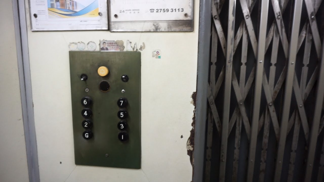 Amazing original gated 1957 OTIS traction elevator @ 84-86 Java Road, Hong Kong