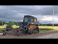 Fixing a Gravel Driveway with a Harley Rake - John Deere 325G