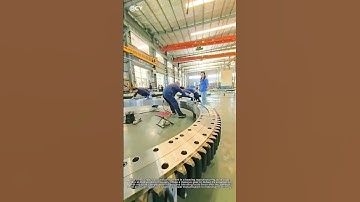 "Giant Gear Debugging in Bearing Factory: Teamwork Meets Precision Engineering!"