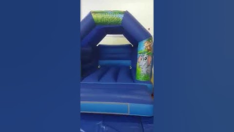 Blue Bouncy Castle with a Jungle Theme