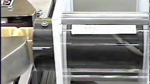 Carleton Helical Feedsrews - Puck Invertor with Belt Drive and timing screws