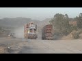 Full loaded trucks and empty trucks in mountains very dangerous drawing