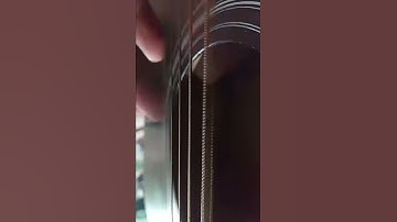 Low E guitar string rhythm.