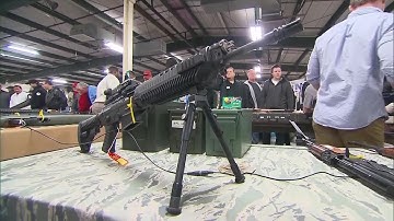 Trump defers to Congress on background checks, 