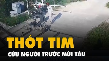 Camera quay cảnh nữ nhân viên gác chắn cứu người trước mũi tàu ở Nghệ An