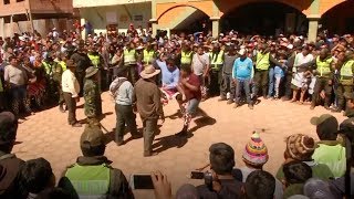 Fists fly at Bolivian fighting festival