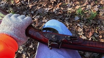 Unloading a flintlock at dusk