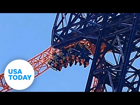 Crazy moment roller coaster stops, strands riders upside down | USA TODAY